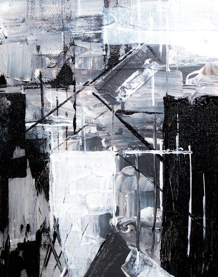 Dynamic abstract painting featuring black, white, and grey tones in an expressionist style.